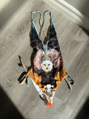 Eagle graphic one piece swimsuit with tie sides and low back one size